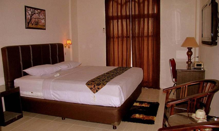 פאנגקאלפינאנג Hotel Mitra Garden חדר תמונה